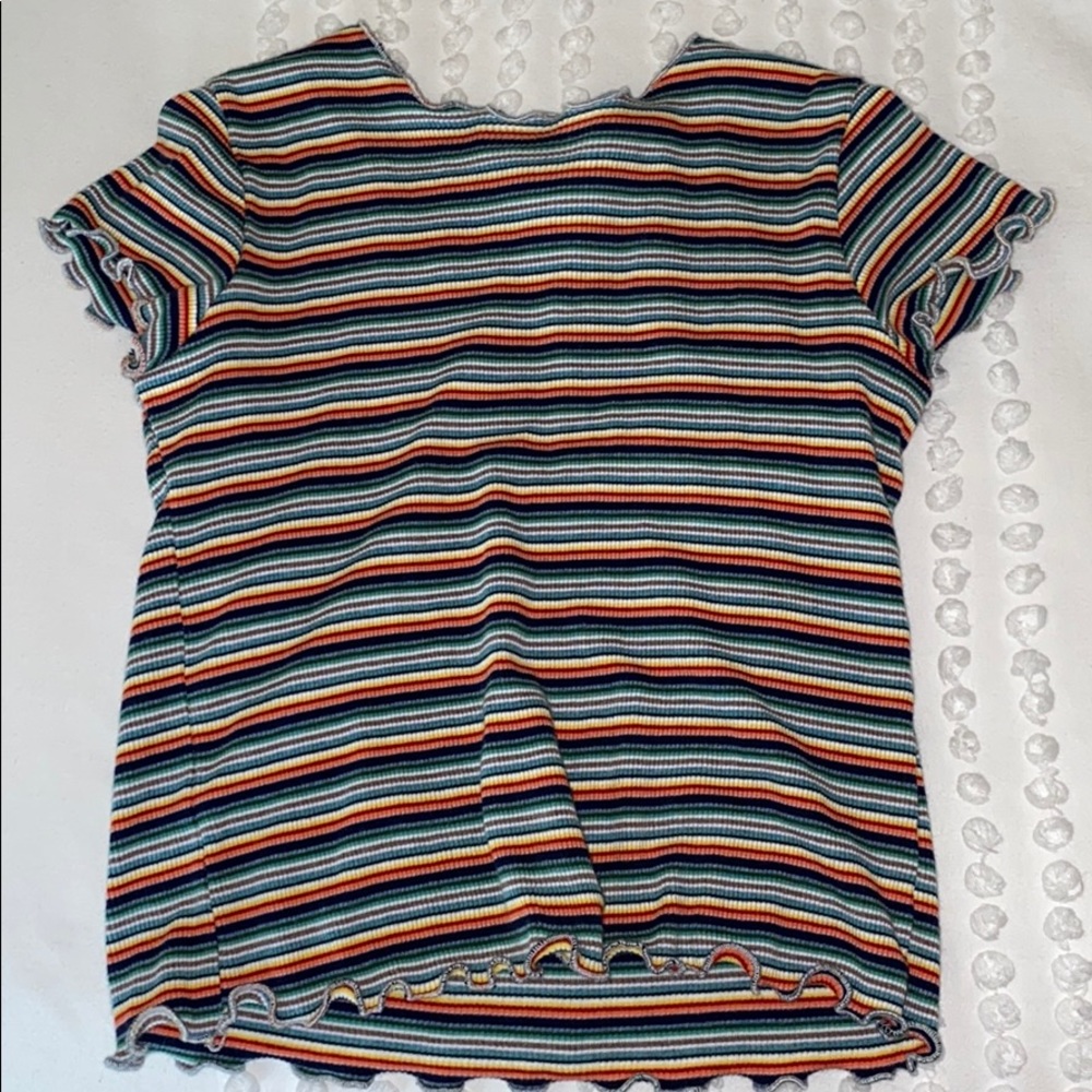 striped shirt with wavy ruffles on the ends